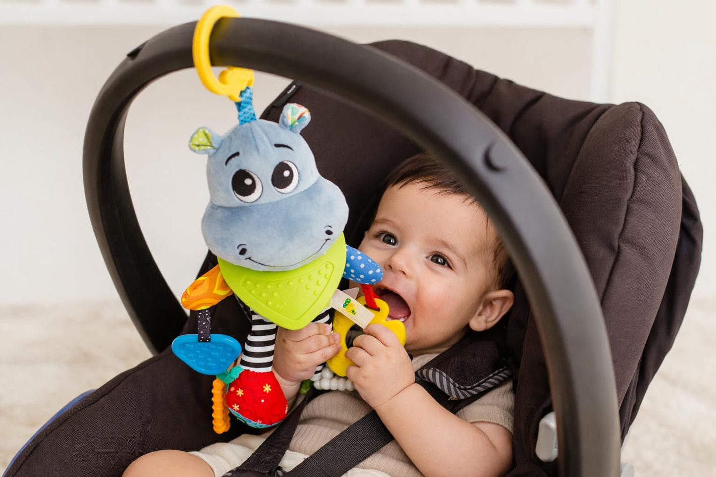 Balibazoo Hippo Hanging Baby Activity Toy – Soft Plush Sensory Toy with 3 BPA-Free Silicone Teethers, Crinkle Ears & Hidden Bell | Clip for Stroller and Car Seat | Developmental Toy 0-24M | Gift