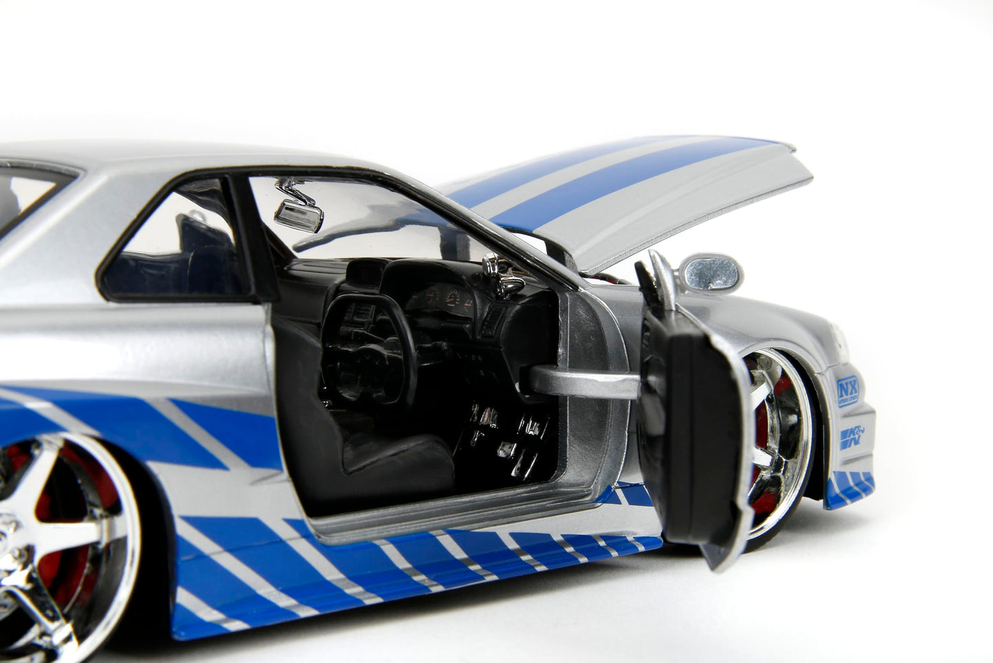 Jada Toys Fast & Furious Brian’s 2002 Nissan Skyline R34 Die-cast Car, 1:24 Scale, Silver & Blue