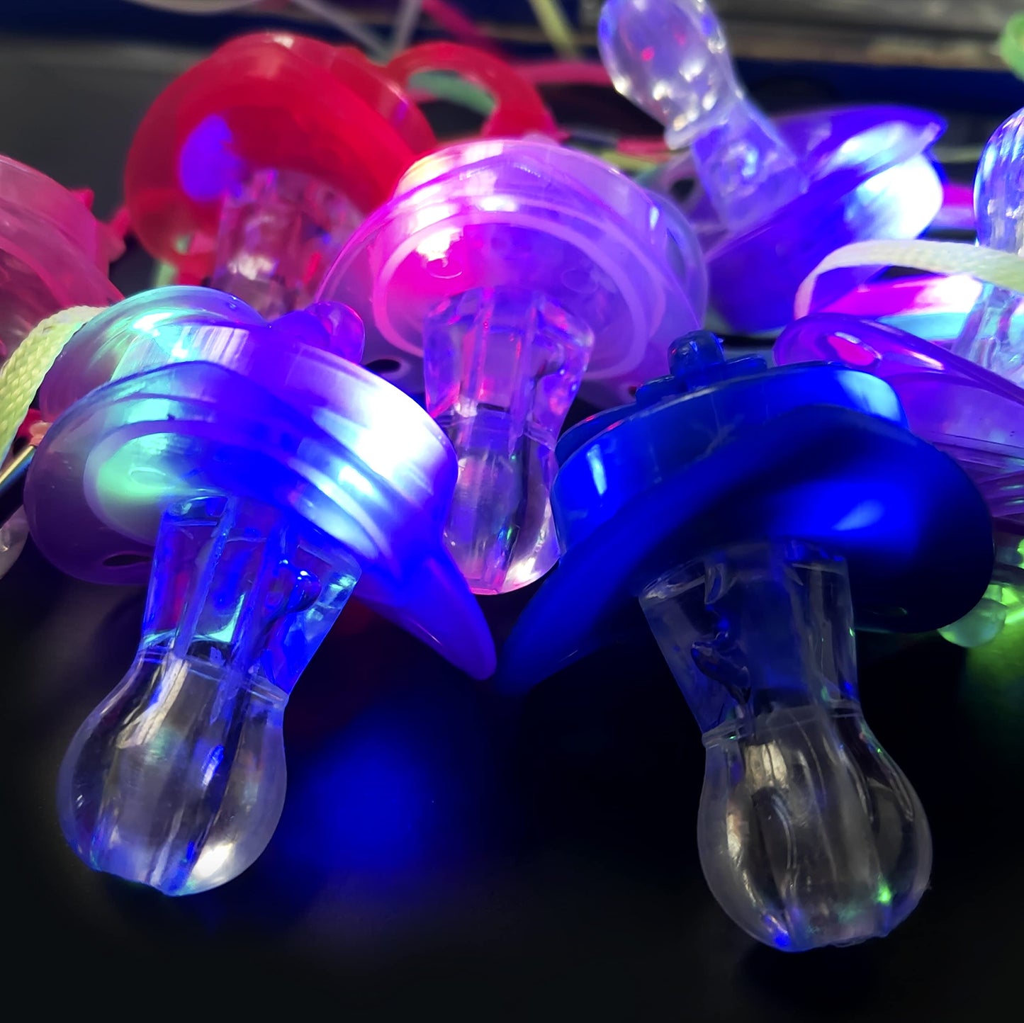 PROLOSO 20 PCS Light up Flashing Whistles Glow in the Dark Party Supplies Include 10 Pacifier Whistles and 10 Round Whistles with Lanyard