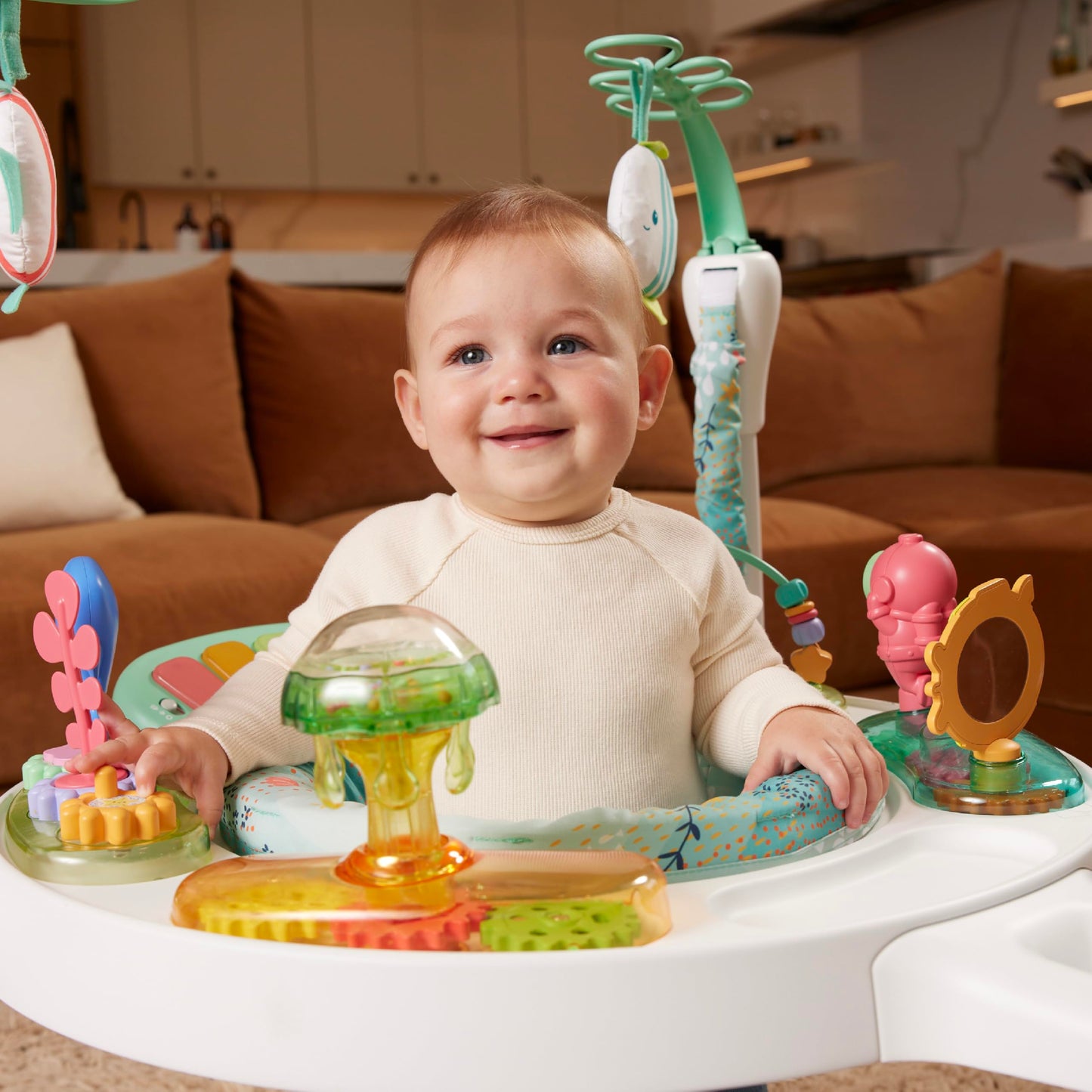 Infantino Magic Motion Activity Jumper, Under the Sea Baby Jumper with 360° Seat, Removable Piano, Lights & Music, Adjustable Height Activity Center, Motor Skills and Sensory Play, Ages 4+ Months